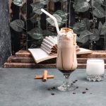 milky-shake-with-chocolate-syrup-cinnamon_114579-4417